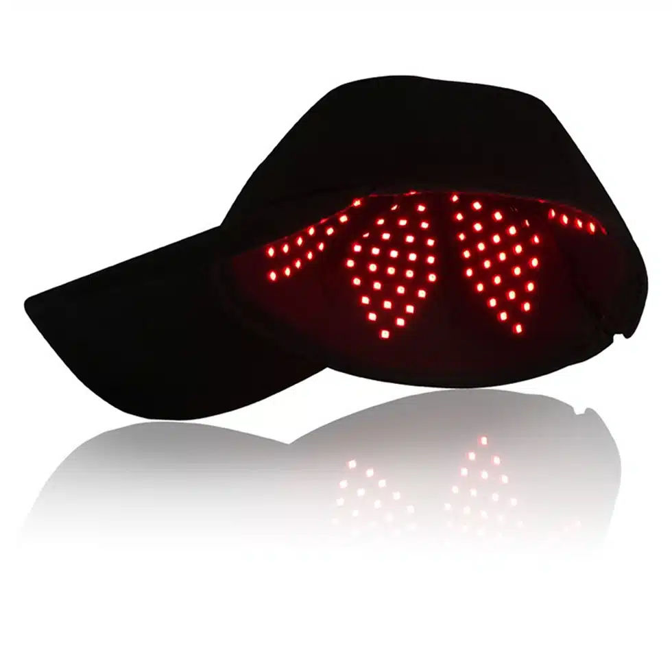 A black hat with hair growth cap lights on it.
